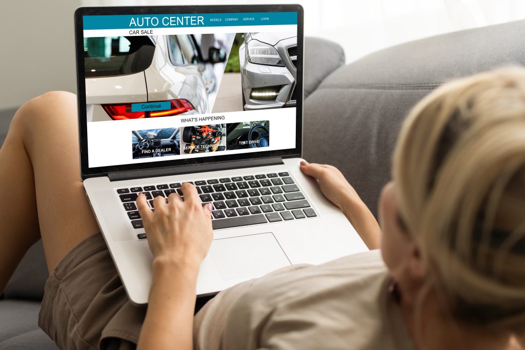 Customer browsing car dealership website online