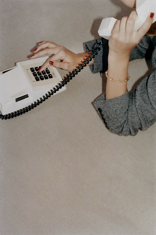 Businesswoman on phone representing client support for digital marketing services